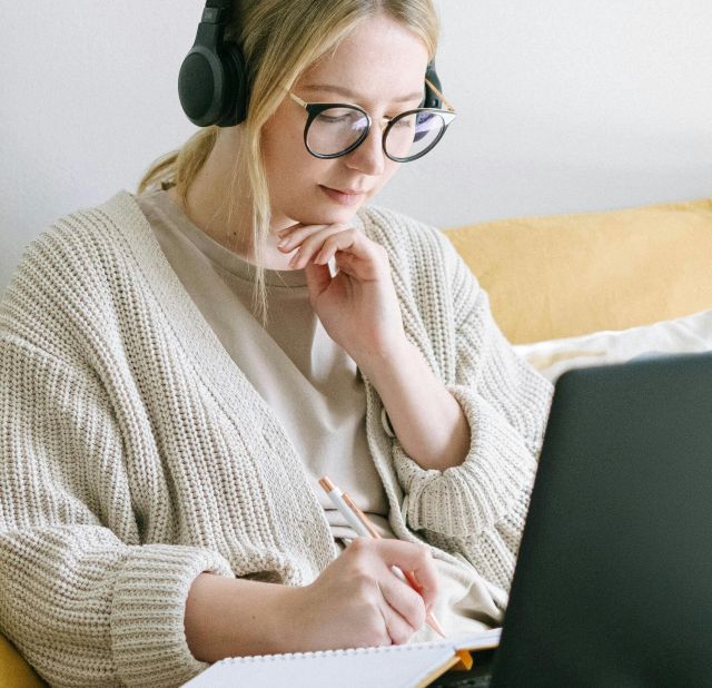 Photo of Woman Taking Notes